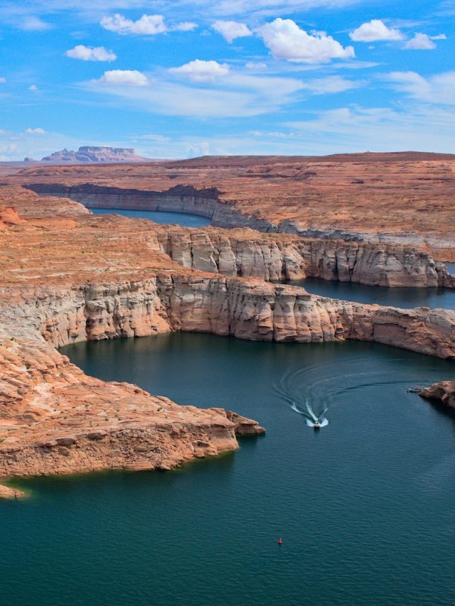 Lake Powell, record low water levels, climate change, environment, conservation, nature, national park, Glen Canyon, water supply, ecosystem, side canyons, hidden gem, recreation industry, tourism, Navajo Nation, landscape, drought, water crisis, global warming, sustainability, natural wonders,