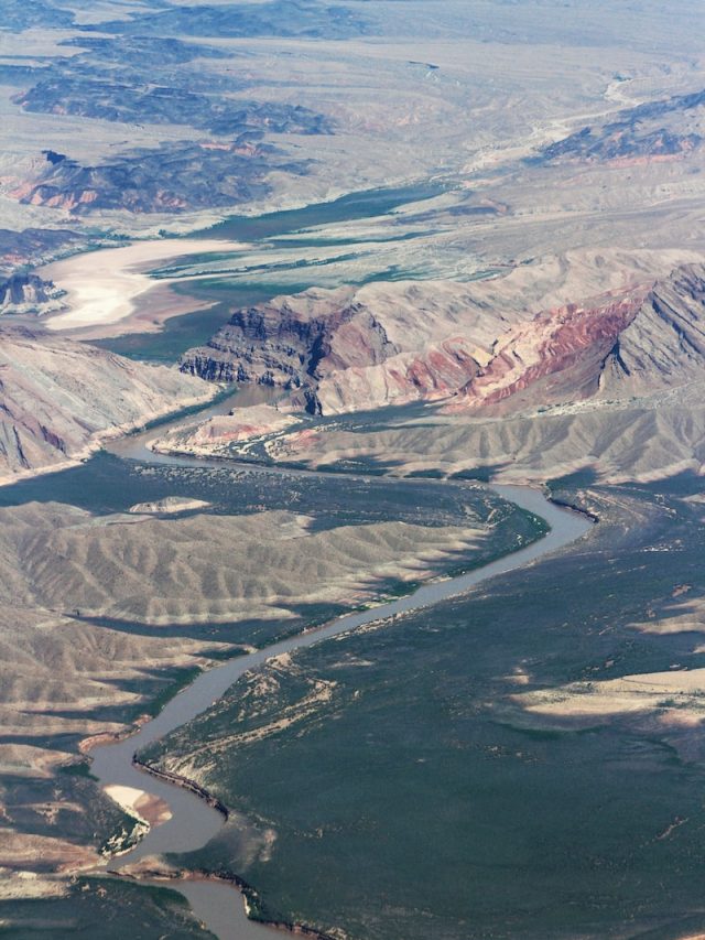 climate change, Colorado River Basin, water loss, water scarcity, drought, megadrought, hydrology, water resources, water management, vegetation, snowpack, runoff, water modeling, greenhouse gas emissions, sustainability, natural resources, western United States, Lake Mead, river flow, water shortage, agriculture, ecosystems, 1922 Colorado River Compact, mitigation strategies, temperature increase, atmospheric CO2, arid climate, water supply, UCLA, study,