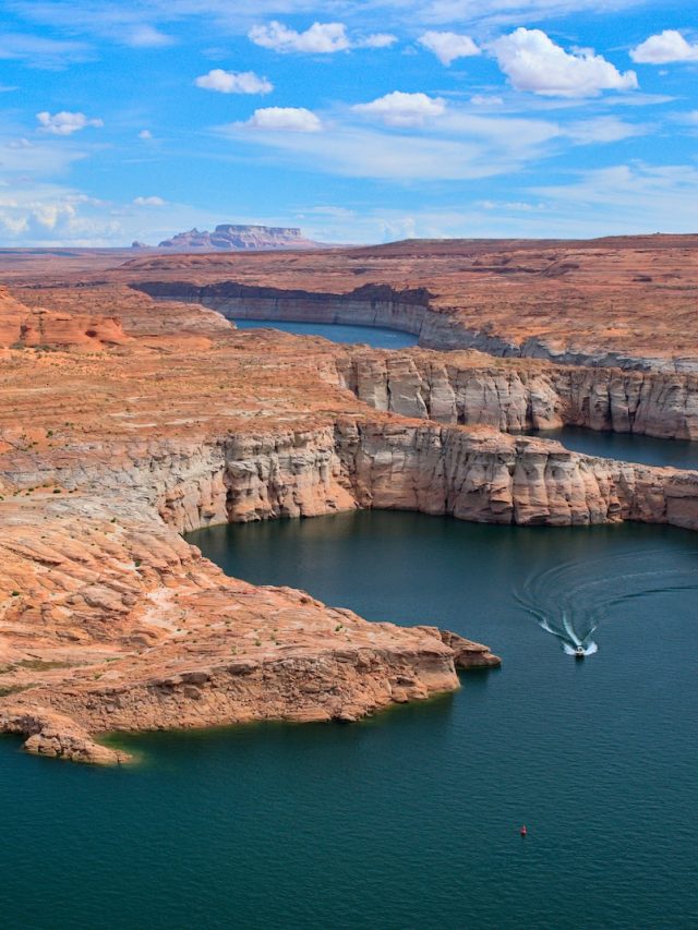 Lake Mead, Lake Powell, Drought, Water scarcity, Water crisis, Colorado River, Water levels, Reservoir depletion, Water management, Water conservation, Water resources, Water supply, Hydrology, Climate change, Drying lakes, Environmental impact, Ecosystem disruption, Water allocation, Water rights, Water policy, Water governance, Water storage, Water infrastructure, Irrigation, Agricultural impacts, Urban water supply, Drinking water, Recreation, Tourism, Fishing, Boating, Water-dependent industries, Economic effects, Energy production, Hydropower, Dam operations, Reservoir capacity, Water rationing, Water restrictions, Water efficiency, Water planning, Water sustainability, Water allocation agreements, Water sharing, Water rights disputes, Evaporation, Groundwater depletion, River flow reduction, Climate variability, Water-dependent ecosystems, Biodiversity loss, Fish habitat, Endangered species, Water conservation measures, Water-saving technologies, Water education, Public awareness, Water pricing, Water demand management, Water infrastructure investment, Water recycling, Desalination, Rainwater harvesting, Water monitoring, Water modeling, Water data analysis, Water policy reform, Water governance reform, Sustainable water practices, Water resilience, Water security, Community resilience, Adaptation strategies, Water crisis management, Stakeholder engagement, Collaborative water management, Water resource planning, Water legislation, Water regulations,