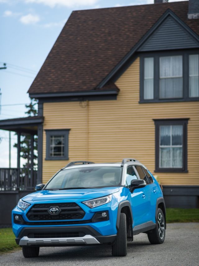 2026 Toyota RAV4 Hybrid in forest, Toyota RAV4 interior with Arene infotainment, RAV4 PHEV charging port,