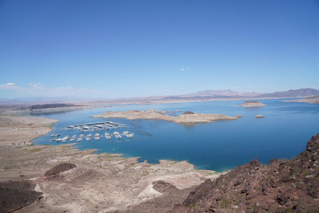Aerial view of Lake Mead warming near Hoover Dam showing declining water levels and climate stress