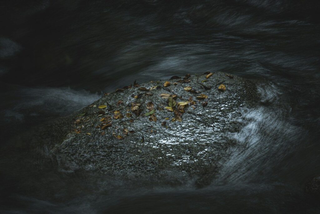 Atmospheric pollution emissions from industrial smokestacks releasing mercury into the air, illustrating human impact on atmospheric mercury levels.