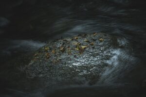 Atmospheric pollution emissions from industrial smokestacks releasing mercury into the air, illustrating human impact on atmospheric mercury levels.