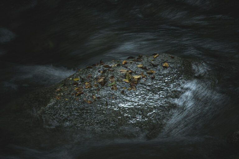 Atmospheric pollution emissions from industrial smokestacks releasing mercury into the air, illustrating human impact on atmospheric mercury levels.