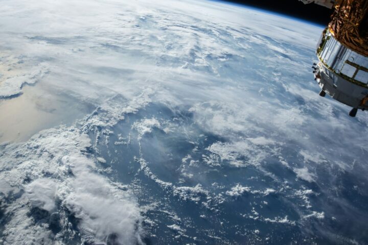 Earth seen from orbit with cloud systems over the ocean, illustrating the ocean-atmosphere coupling behind El Niño