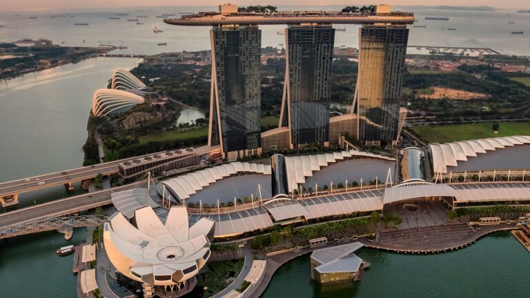 Singapore Marina Bay skyline, home to many SGX-listed companies covered by carbon tax and ISSB climate reporting rules